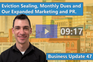 47. New Hire for Marketing and Public Relations (9:17) Executive Director Doug Quattrochi in front of image of a Massachusetts cityscape background with a warm yellow wash. Text reads: "Eviction Sealing, Monthly Dues and Our Expanded Marketing and PR." "Business Update 47" Video is 9 minutes and 17 seconds in duration.