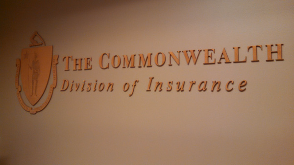 Picture of the wall sign at the Commonwealth Division of Insurance