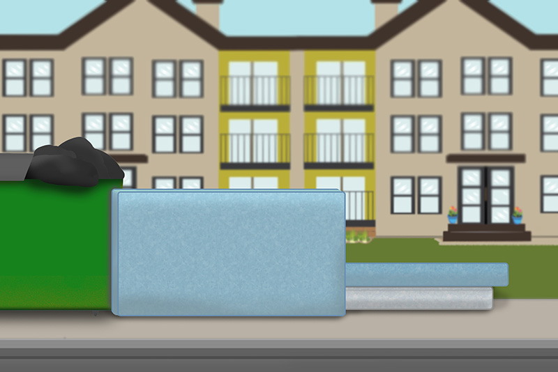This is a cartoon image of a large apartment complex in the background, with a green Dumpster out front. Several white and blue mattresses are piled on the ground beside the dumpster.