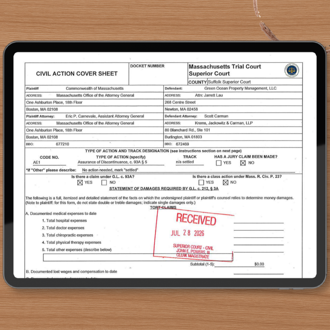 an iPad on a woodgrain tabletop shows the cover sheet for the settlement between the Massachusetts attorney general’s office and Green Ocean Property Management.