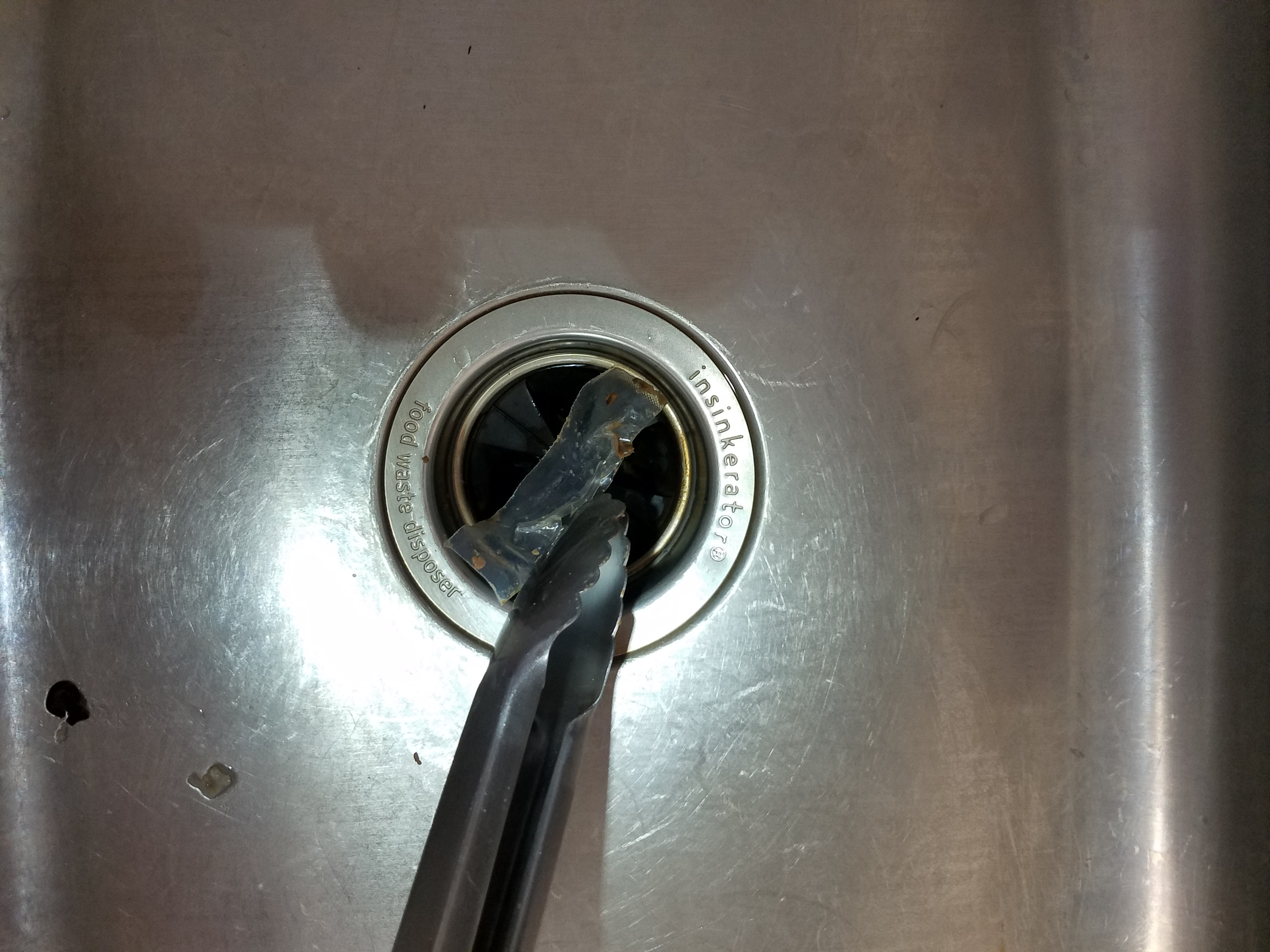 how to fix a garbage disposal step six