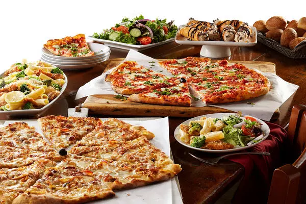 A pizza buffet and salad creates a welcome addition to real estate networking and training.
