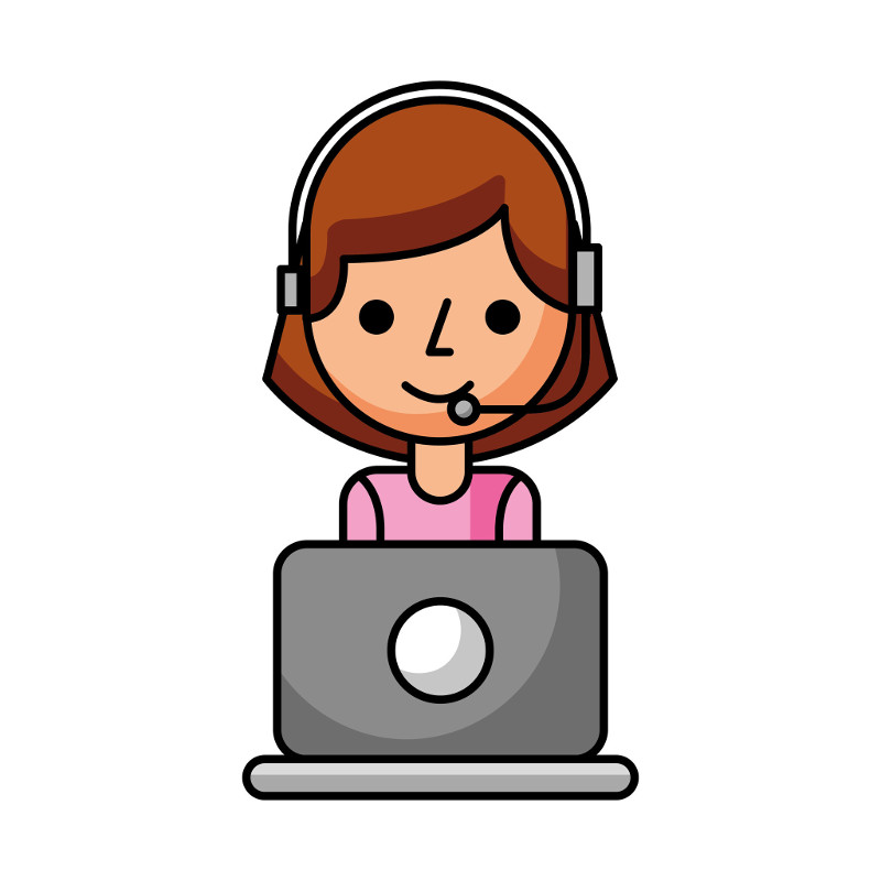 A woman smiles and talks into a headset while looking at her computer.