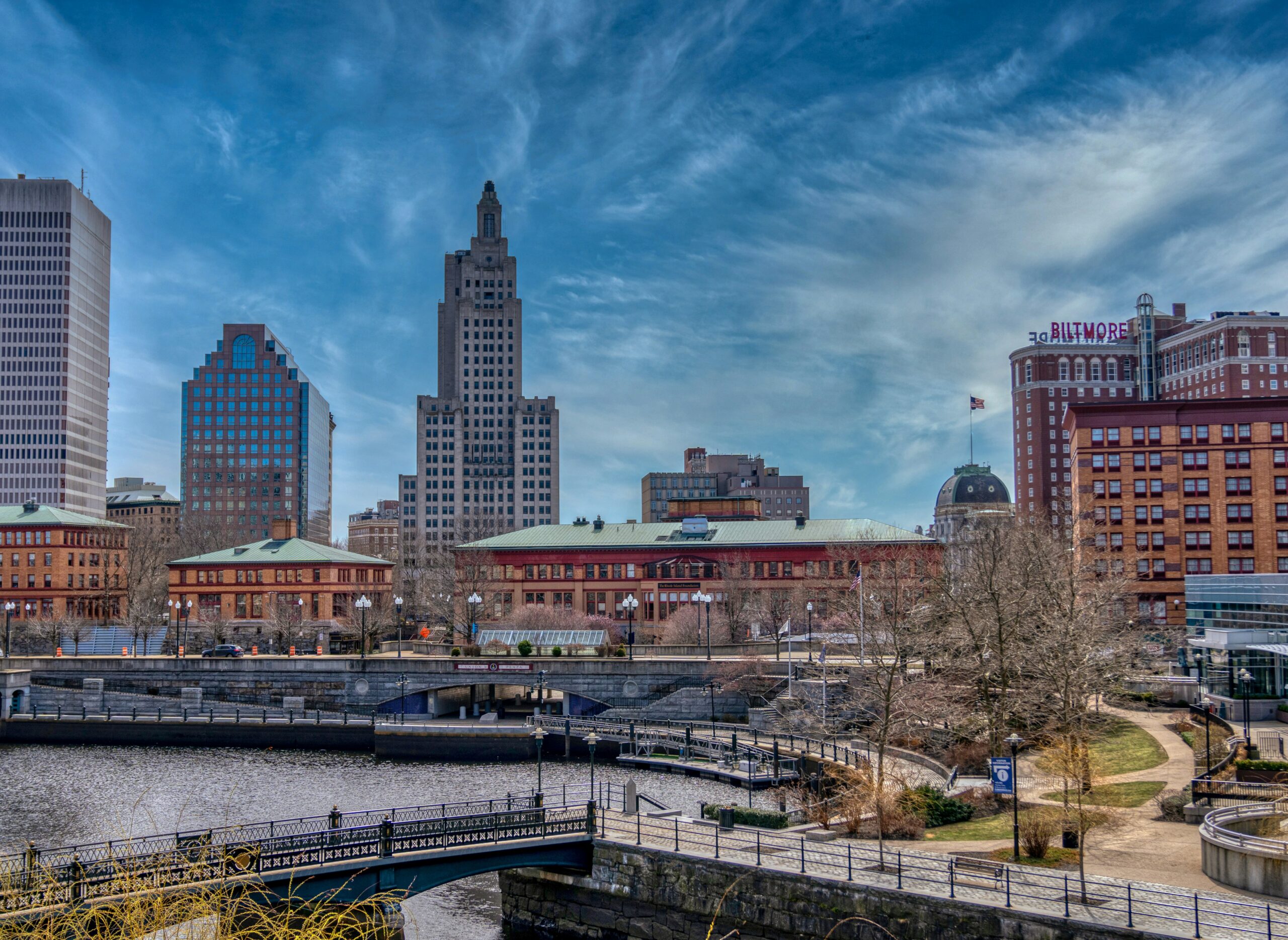 A photograph shows a wide view of part of the Providence skyline.