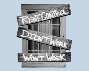 A photorealistic logo of a boarded-up window has these words across three boards: Rent Control. Didn’t Work. Won’t Work.
