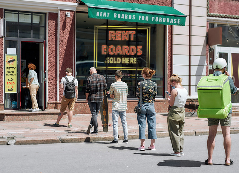 Seven people of various sizes, shapes and colors line up outside a building. Multiple signs advertise petty rent boards for purchase.