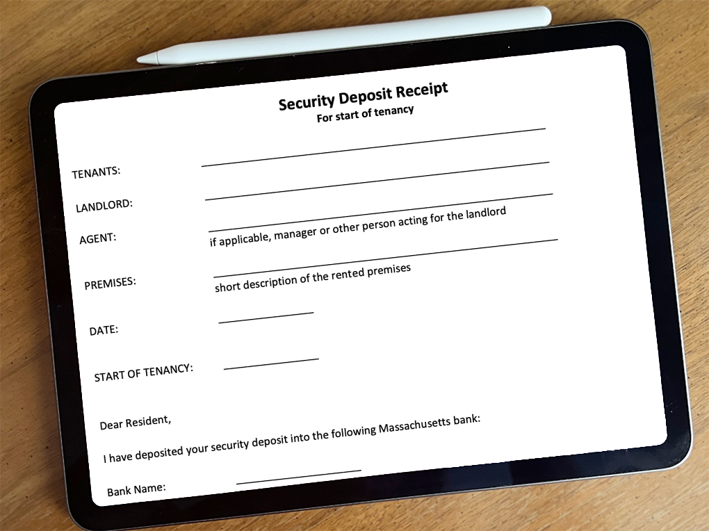 An iPad screen has an image of a blank security deposit receipt form pulled up.