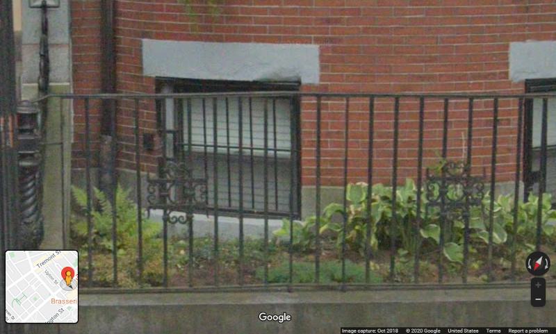 picture of basement exterior showing newly repointed masonry, granite plinth and modern working window