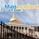 The Massachusetts state capitol on Beacon Hill sits behind imposing wrought iron fencing, but the MassLandlords logo flying above it shows we can succeed.